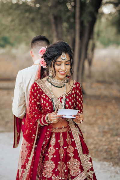 Indian bride reading Love letter given by Indian groom