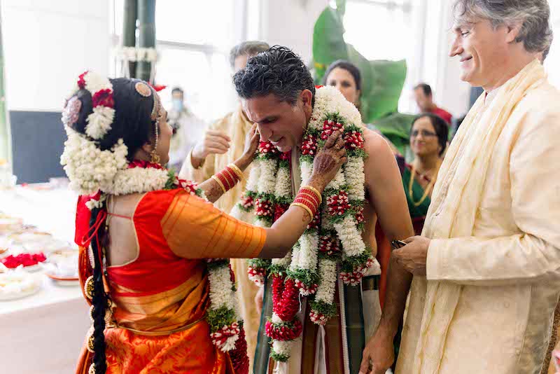 Indian groom wearing garland 