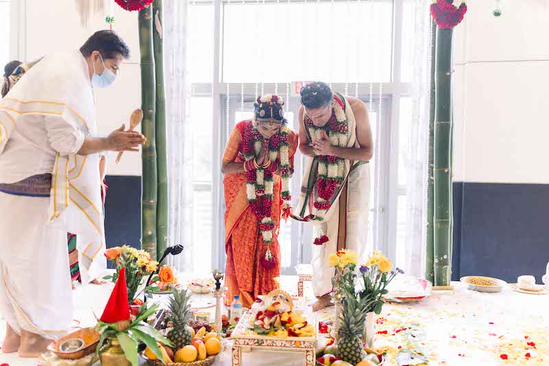 Indian couple worshipping 