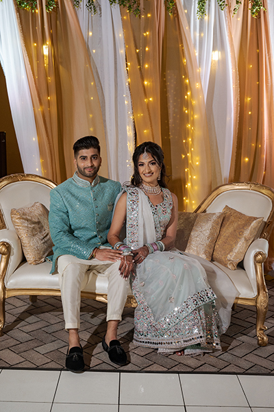 Indian couple posing for a photo