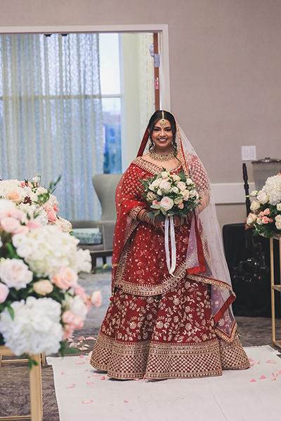 Bride holding flowers for a photo