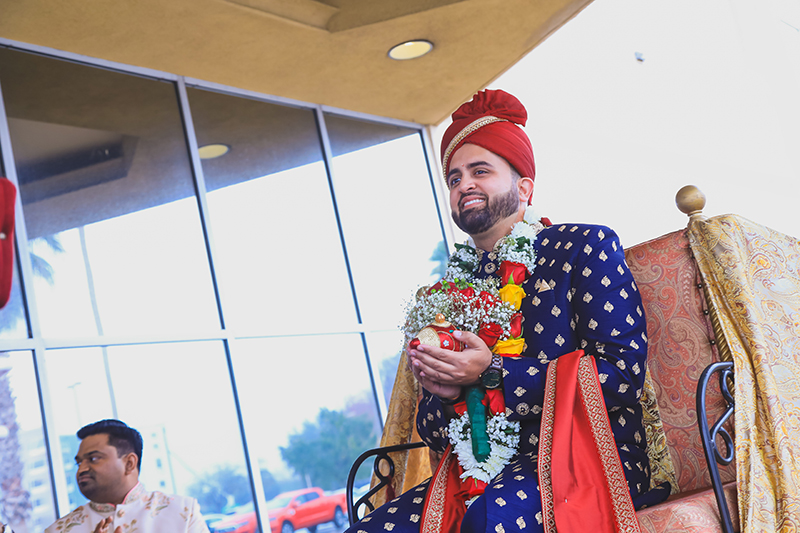 Indian groom entering by horse carriage