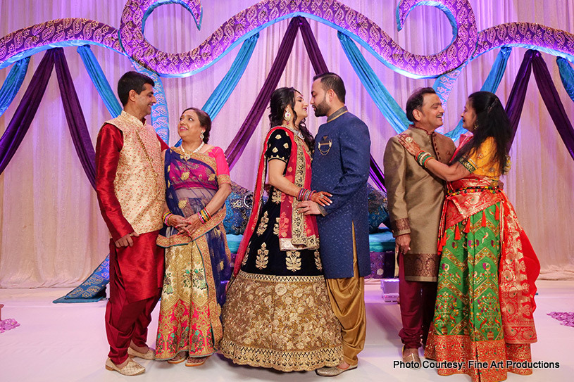 Indian Couple posing with their Parents