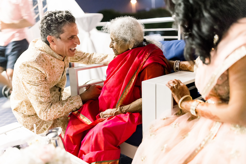 Indian groom taking blessings from Grand mother