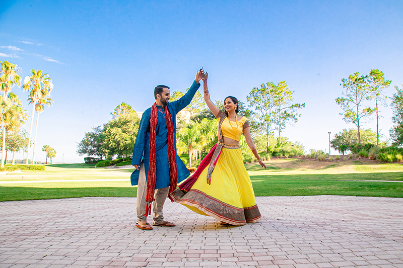 Indian Bride and Groom Holding Hands