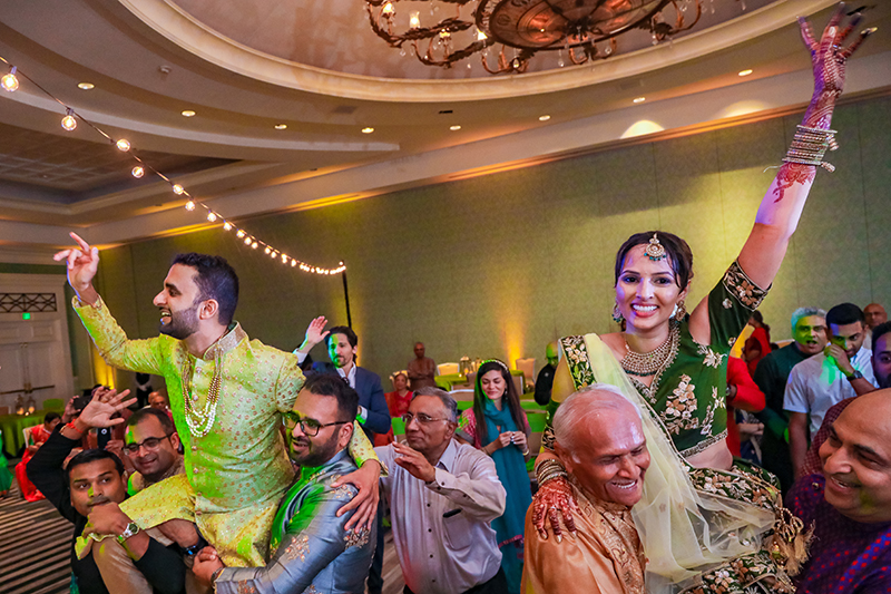 Indian couple having fun at sangeet