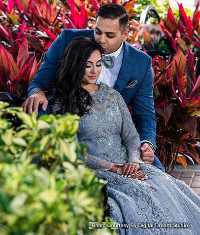 Indian Groom Kissing on Indian Bride's Head