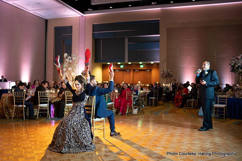 Indian Bride and groom playing Games at wedding ceremony