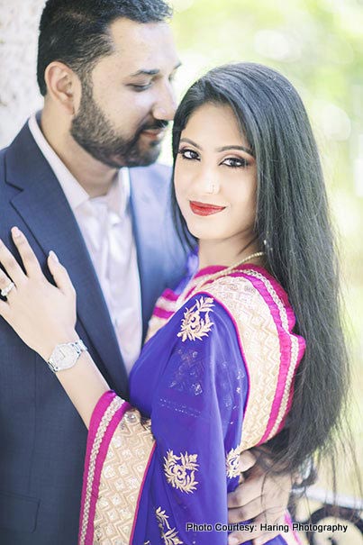 Groom looking at Indian Bride