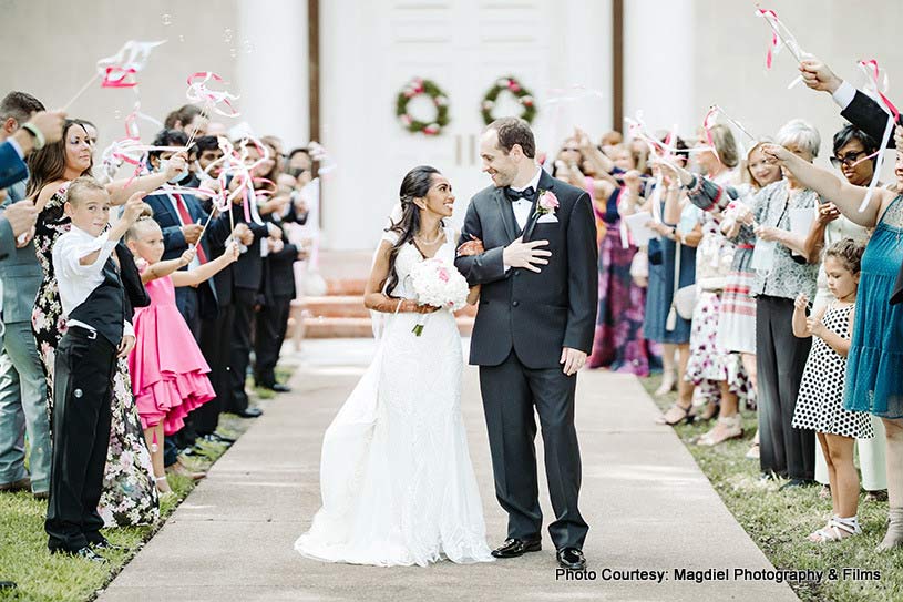 Couple walking to the wedding spot