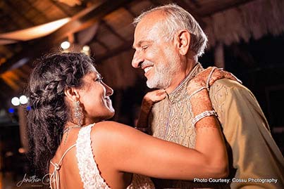 Indian Bride dancing with family member