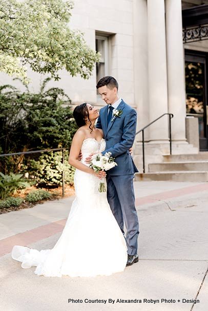 bride and groom looking to each other