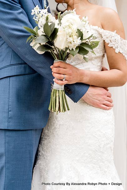 Bride holding wedding bouquet 