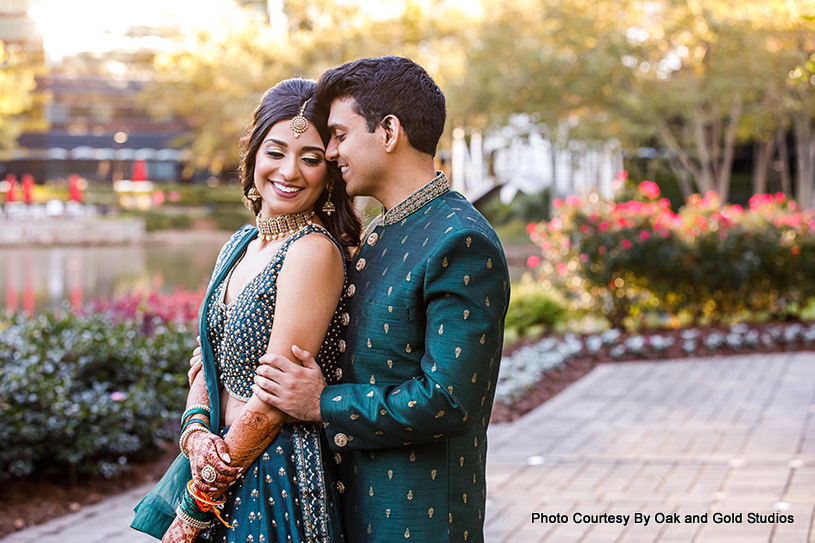 romantic pose by Indian wedding couple