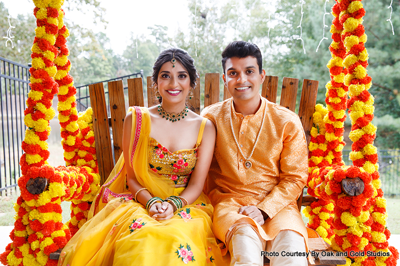 Indian bride and groom ready for their haldi ceremony