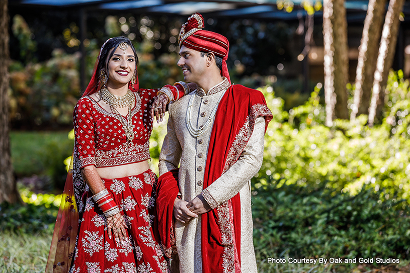 This Indian bride and groom pose for beautiful wedding portraits.
