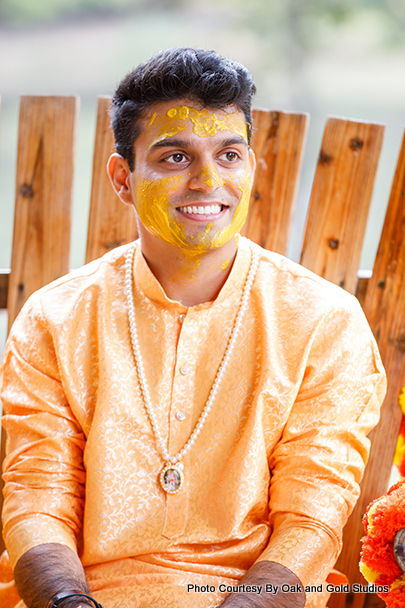 Haldi on indian groom's face
