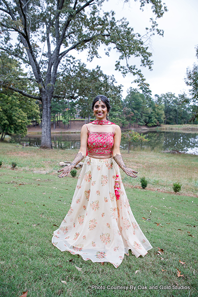 Dazzling Indian Bride showing her mehendi