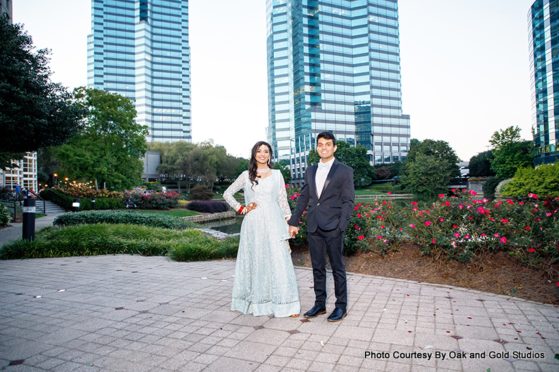 Indian wedding couple possing for outdoor shoot