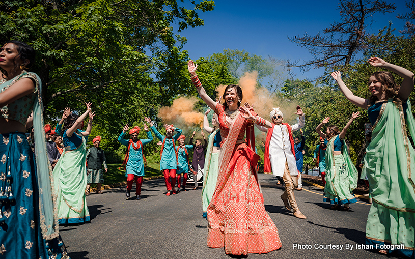 Indian wedding couple dancing in Baraat