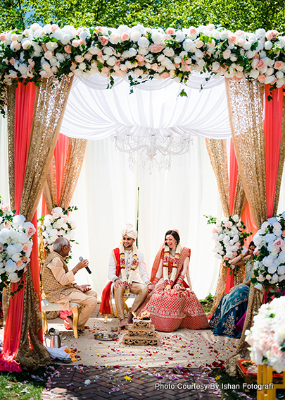 Wedding couple listening priest carefuly 