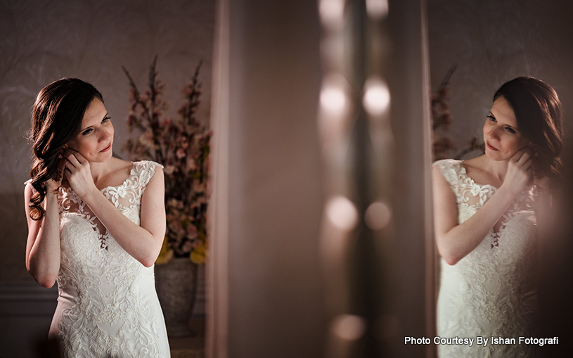 Bride getting ready for wedding reception