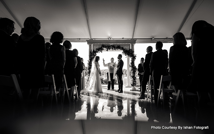 Bride and groom looking to each other