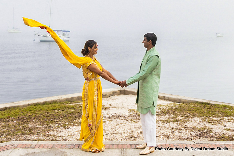 Indian wedding couple looking to each other 