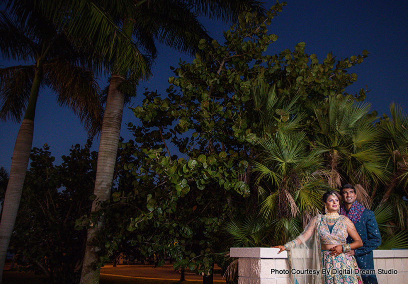 wedding couple looking at the moon capture