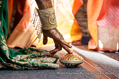 Indian bride's mother welcoming indian groom