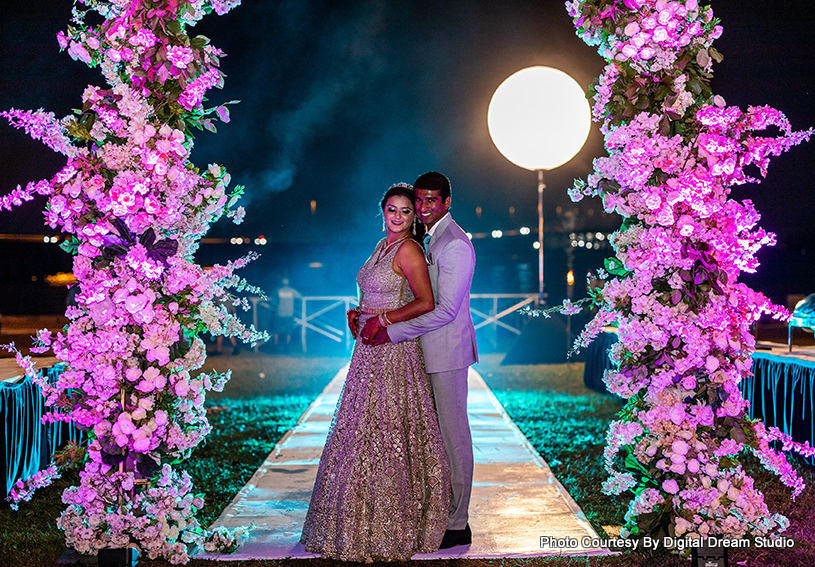 Indian wedding couple enjoying photoshoot moment