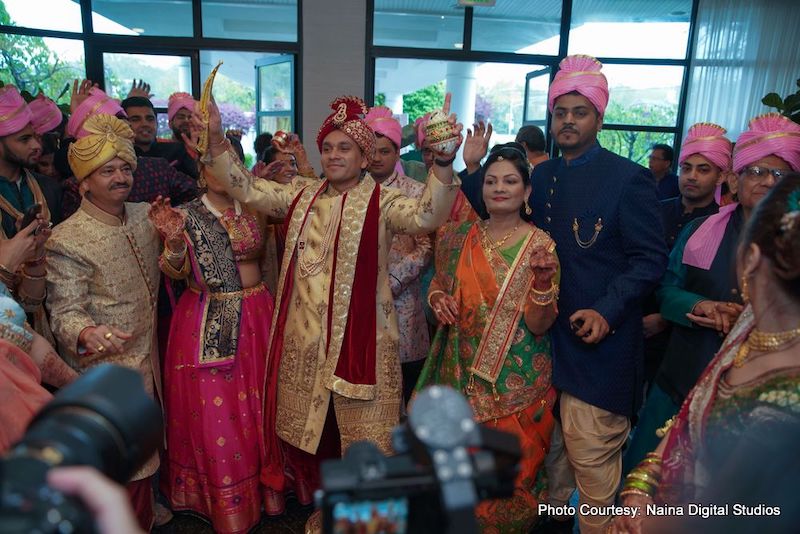 Indian Groom Dancing with his guest in Baraat