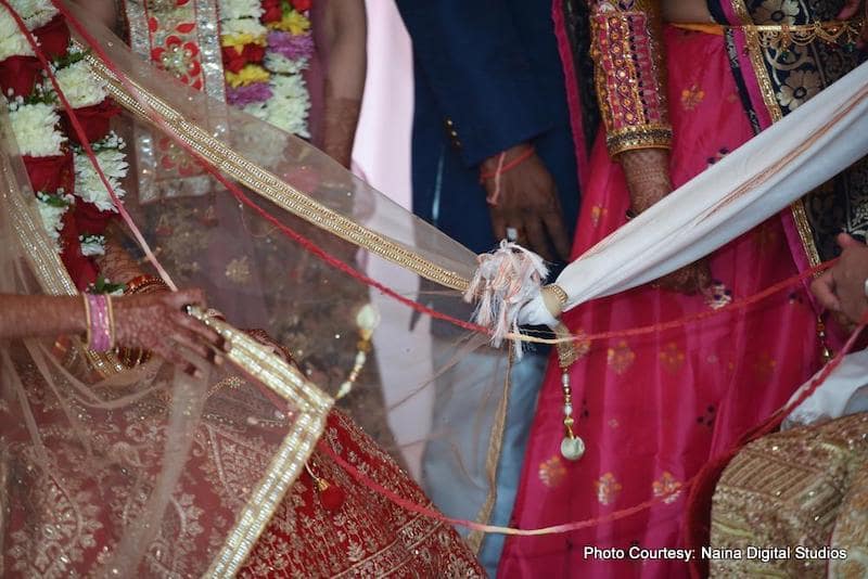 Gath Bandhan - tied Indian Bride and Groom's Chunri