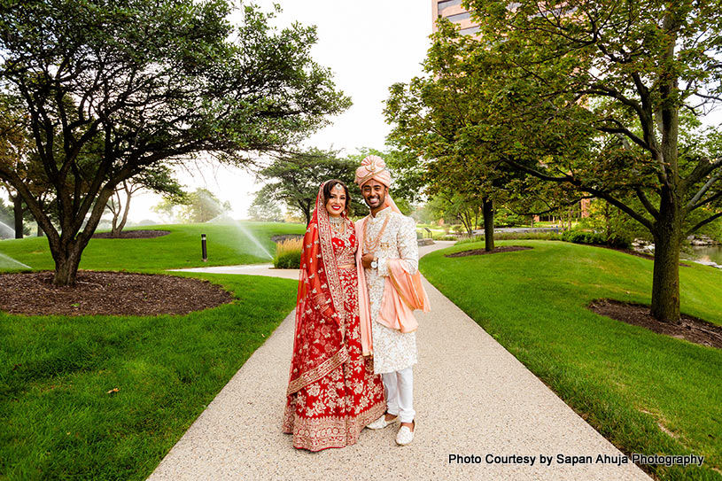  Indian wedding couple poses for outdoor shoot