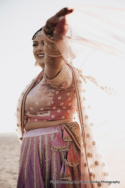 twirling bride in wedding lehenga