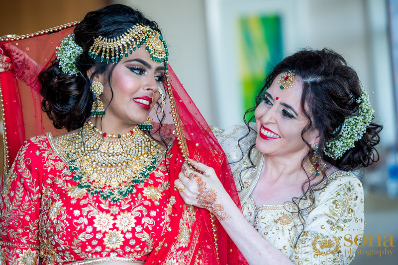 Bride's Mother with Bride posing for picture