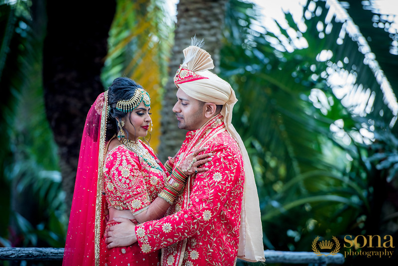 Indian couple posing outdoors