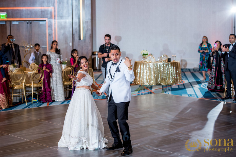 Indian couple dancing at reception