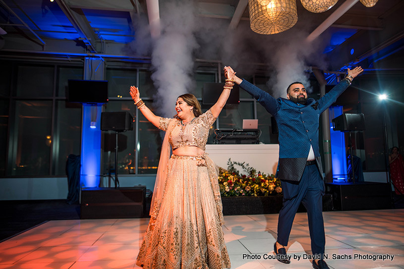 Indian couple on dance floor capture