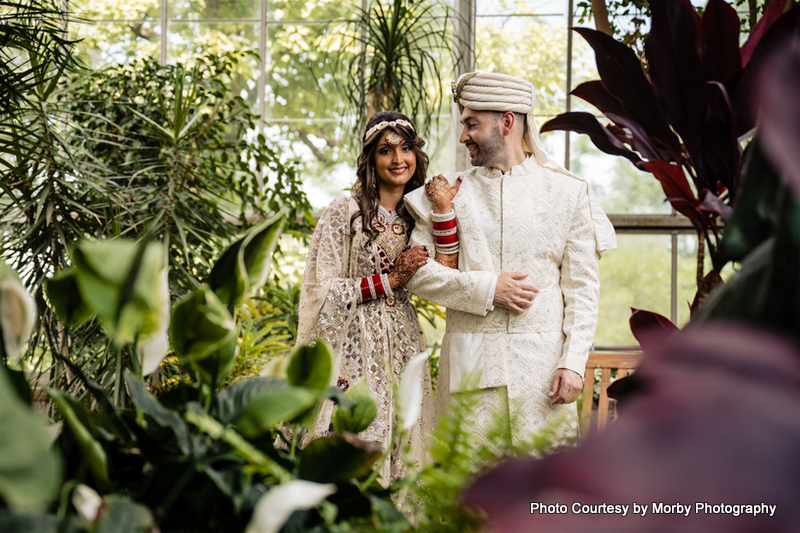 Indian wedding couple possing for outdoor photoshoot