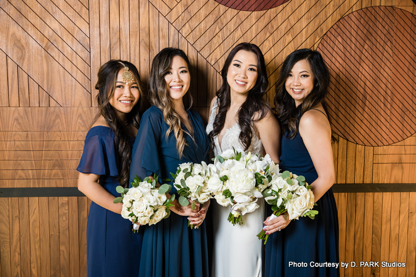 Indian bride with bridesmaid