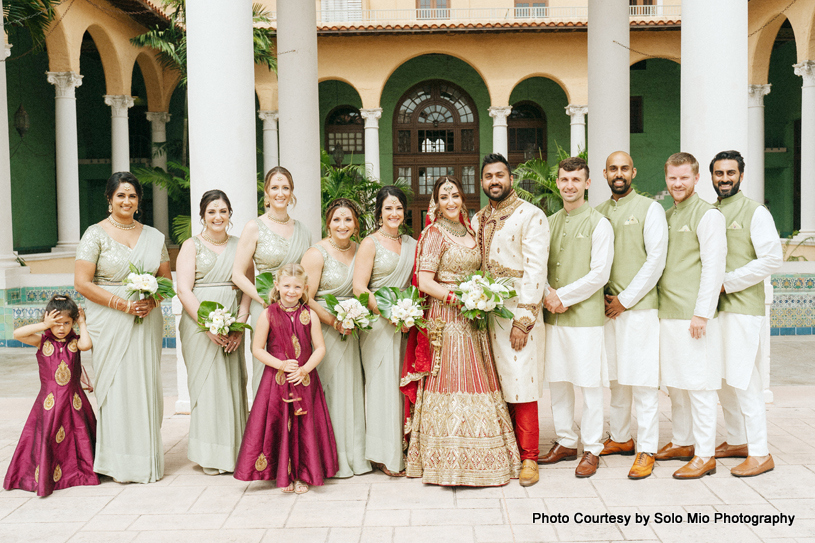 Indian bride and groom with their friends