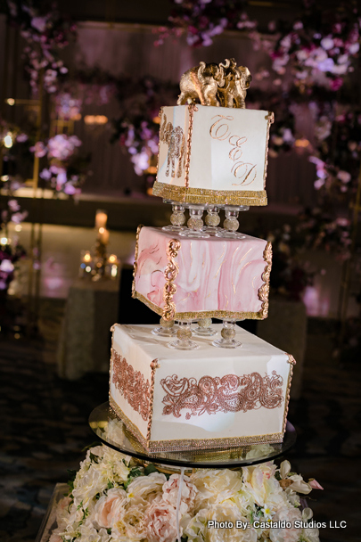Three layer wedding cake with elephant decoration
