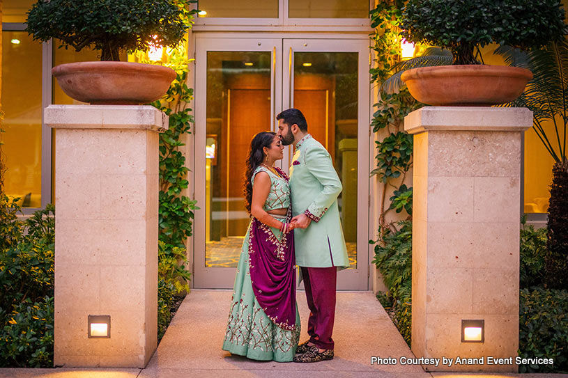 Indian groom kissing to Indian Bride