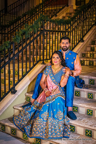 Indian Bride and groom sitting on the stairs