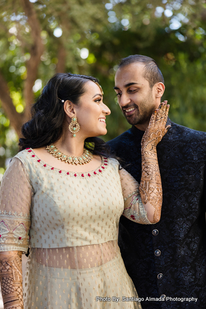  Indian couple striking a romantic pose, creating a timeless moment