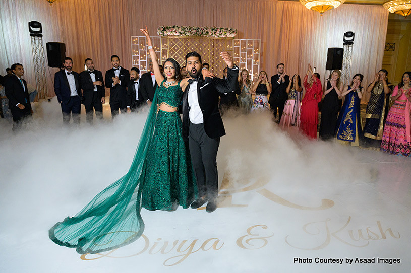 Indian bride and groom enjoying on dance floor