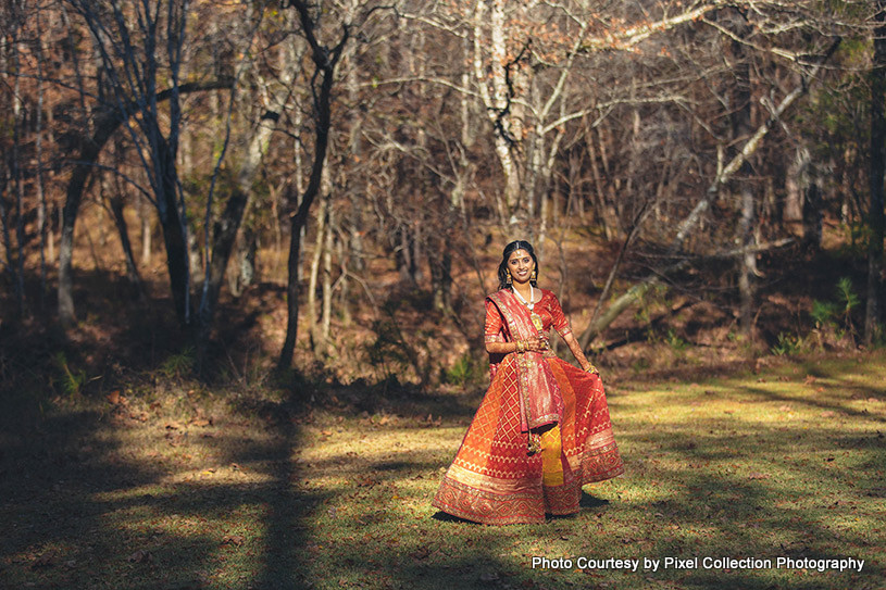 Indian bride possing for outdoor photoshoot