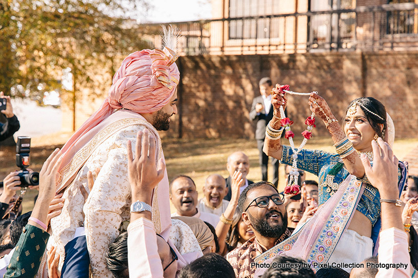 Indian bride welcoming her would be husband