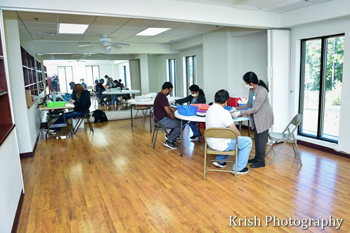 Dr Sujatha Reddy initiated the Health Fair Doctor examines Patient